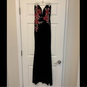 Windsor prom dress with embroidered details and rhinestoning.